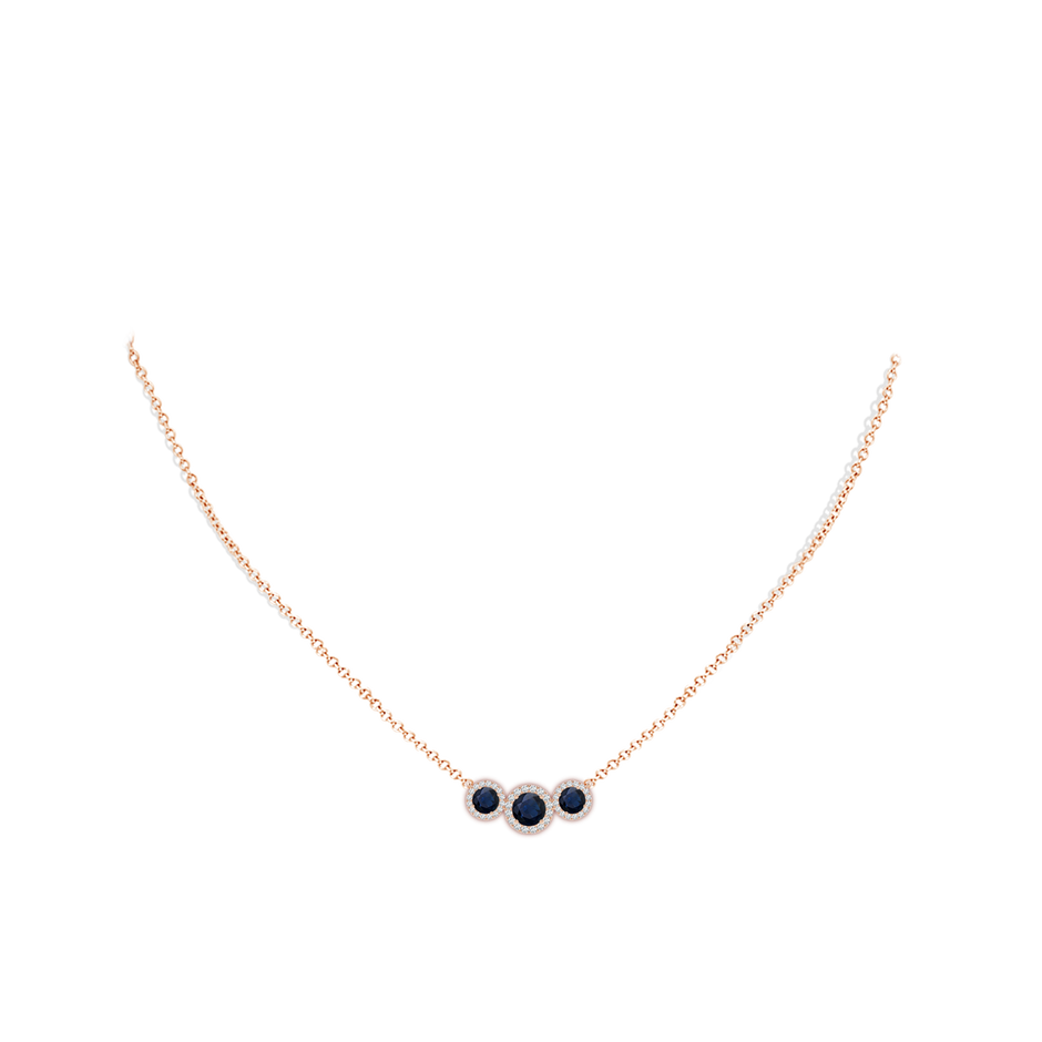 5mm A Three Stone Round Blue Sapphire Halo Pendant in Rose Gold pen