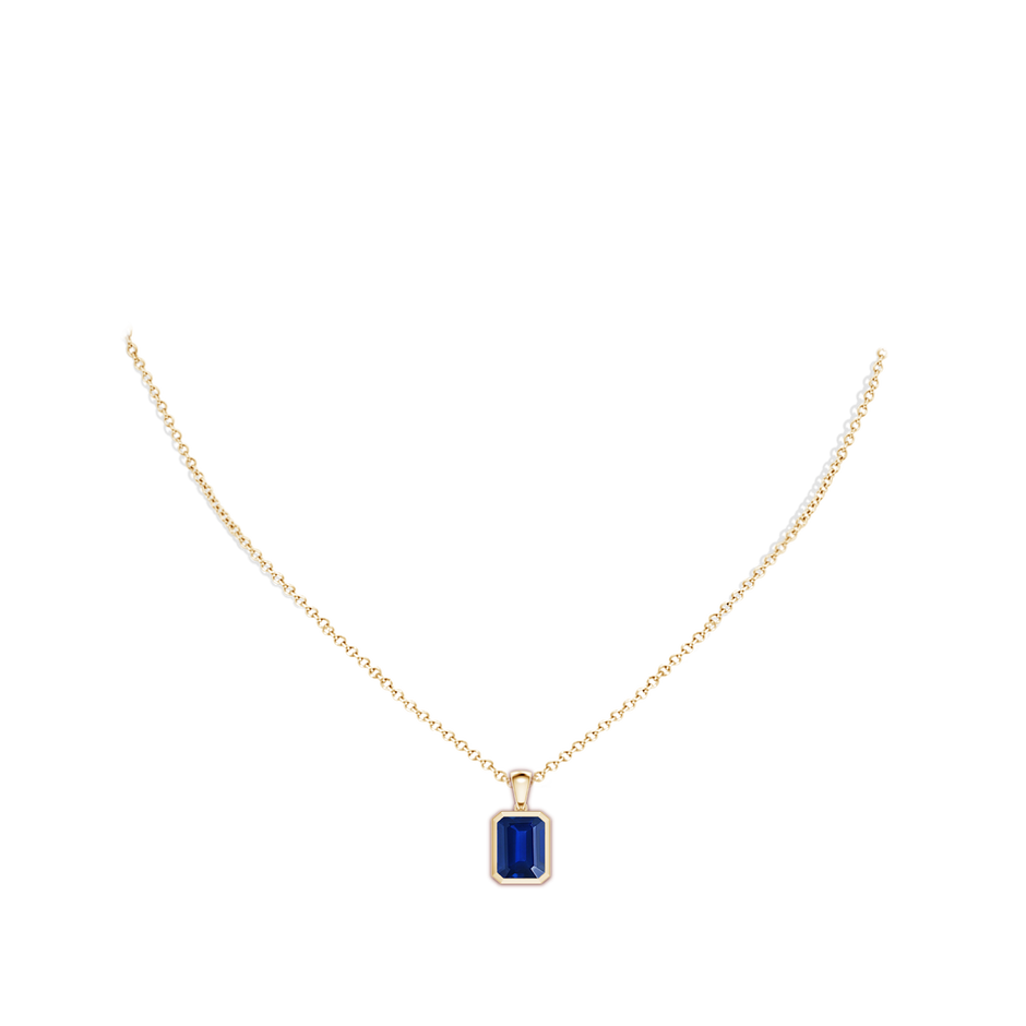 10x8mm Lab-Grown Bezel-Set Emerald-Cut Blue Sapphire Solitaire Pendant in Yellow Gold pen