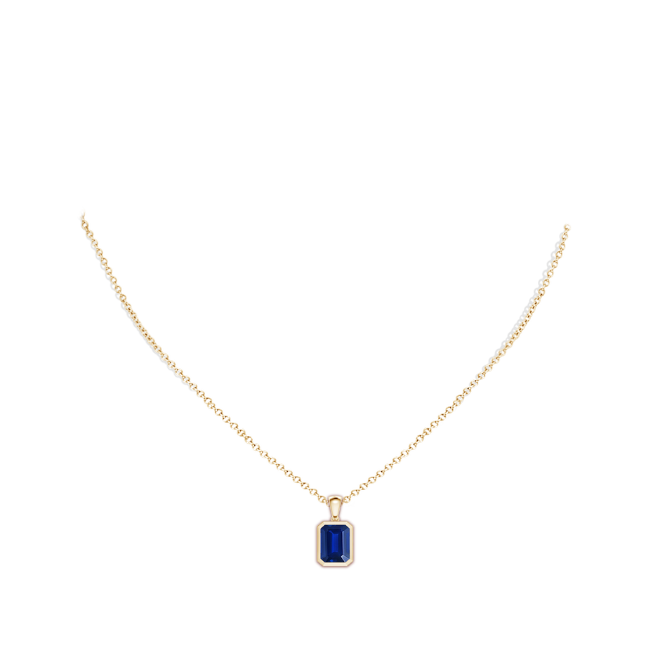 9x7mm Lab-Grown Bezel-Set Emerald-Cut Blue Sapphire Solitaire Pendant in Yellow Gold pen