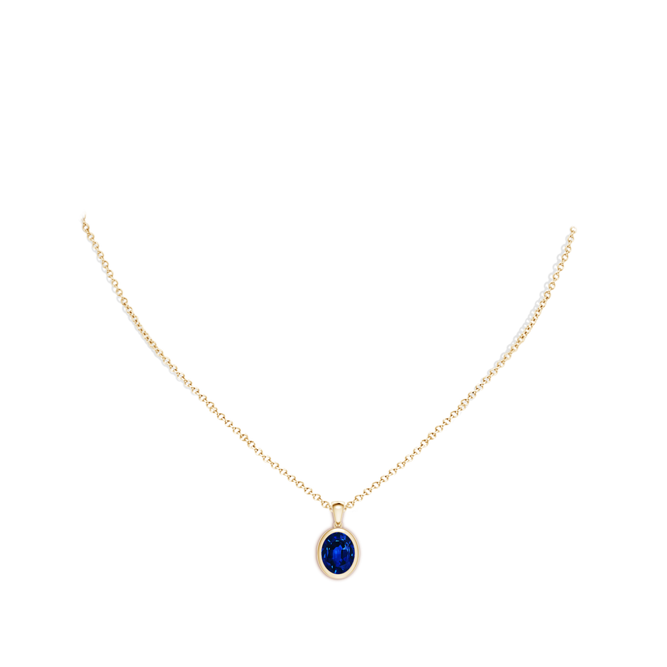 10x8mm Lab-Grown Bezel-Set Oval Blue Sapphire Solitaire Pendant in Yellow Gold pen