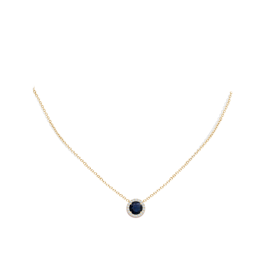 8mm A Vintage Inspired Round Blue Sapphire Halo Pendant in Yellow Gold pen