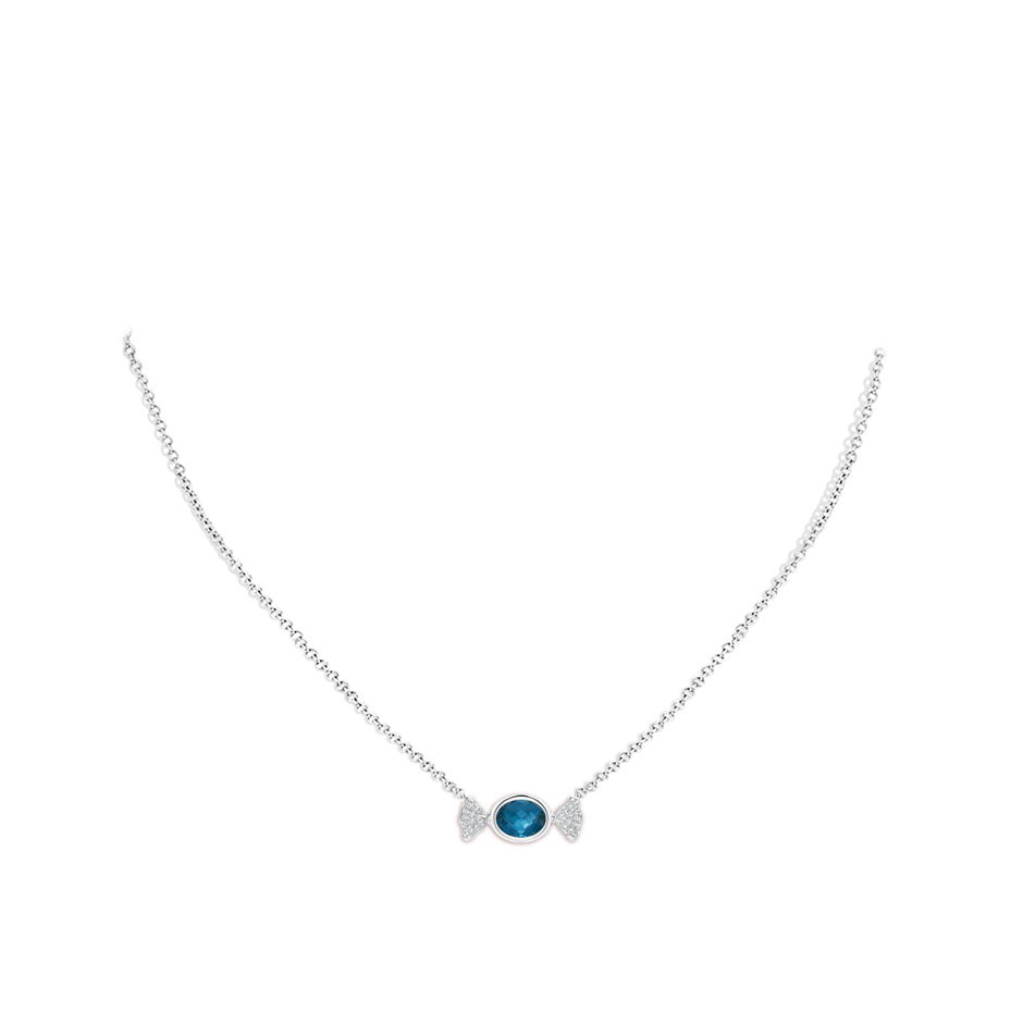 8x6mm AAA Sweet Treats Oval London Blue Topaz Candy Pendant with Diamond Accents in White Gold pen