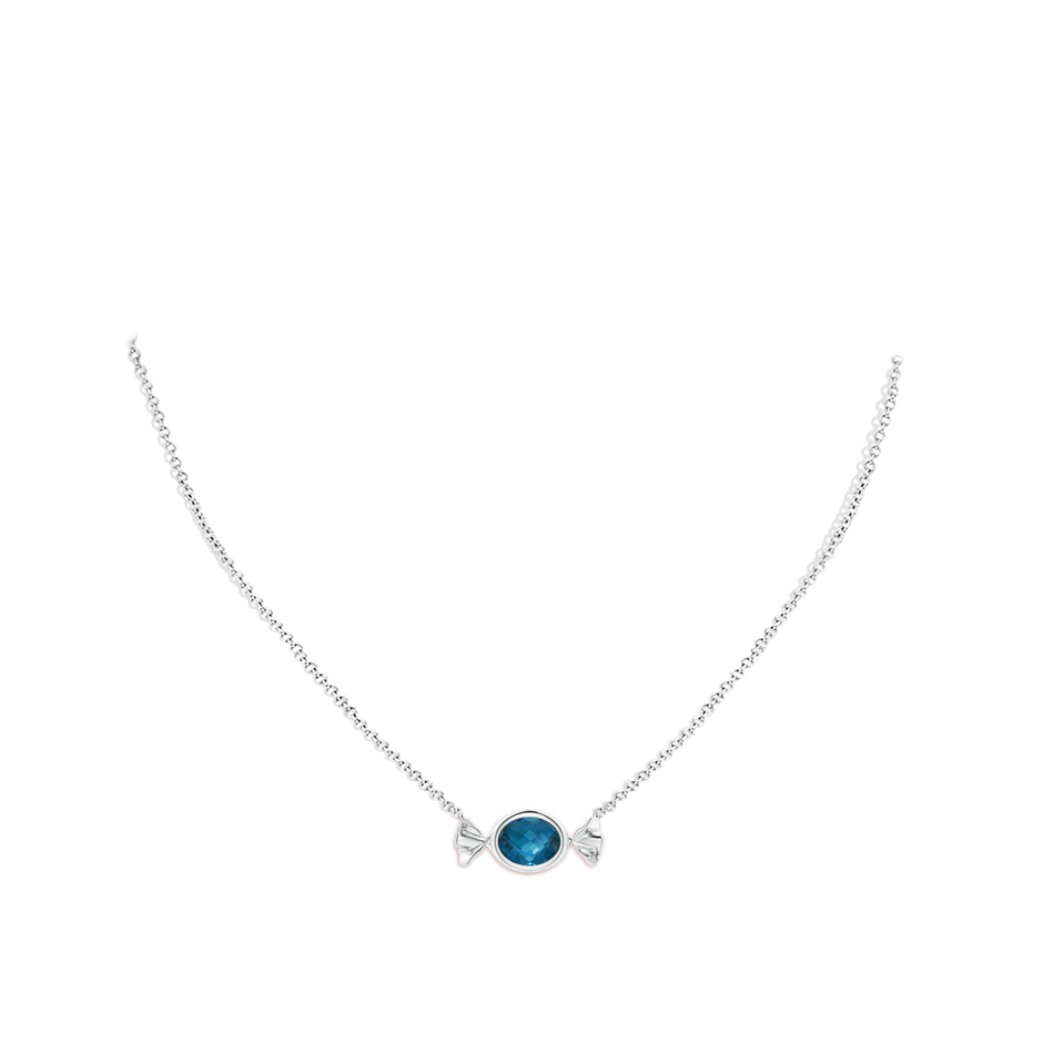 9x7mm AAA Sweet Treats Oval London Blue Topaz Reversible Candy Pendant in White Gold pen