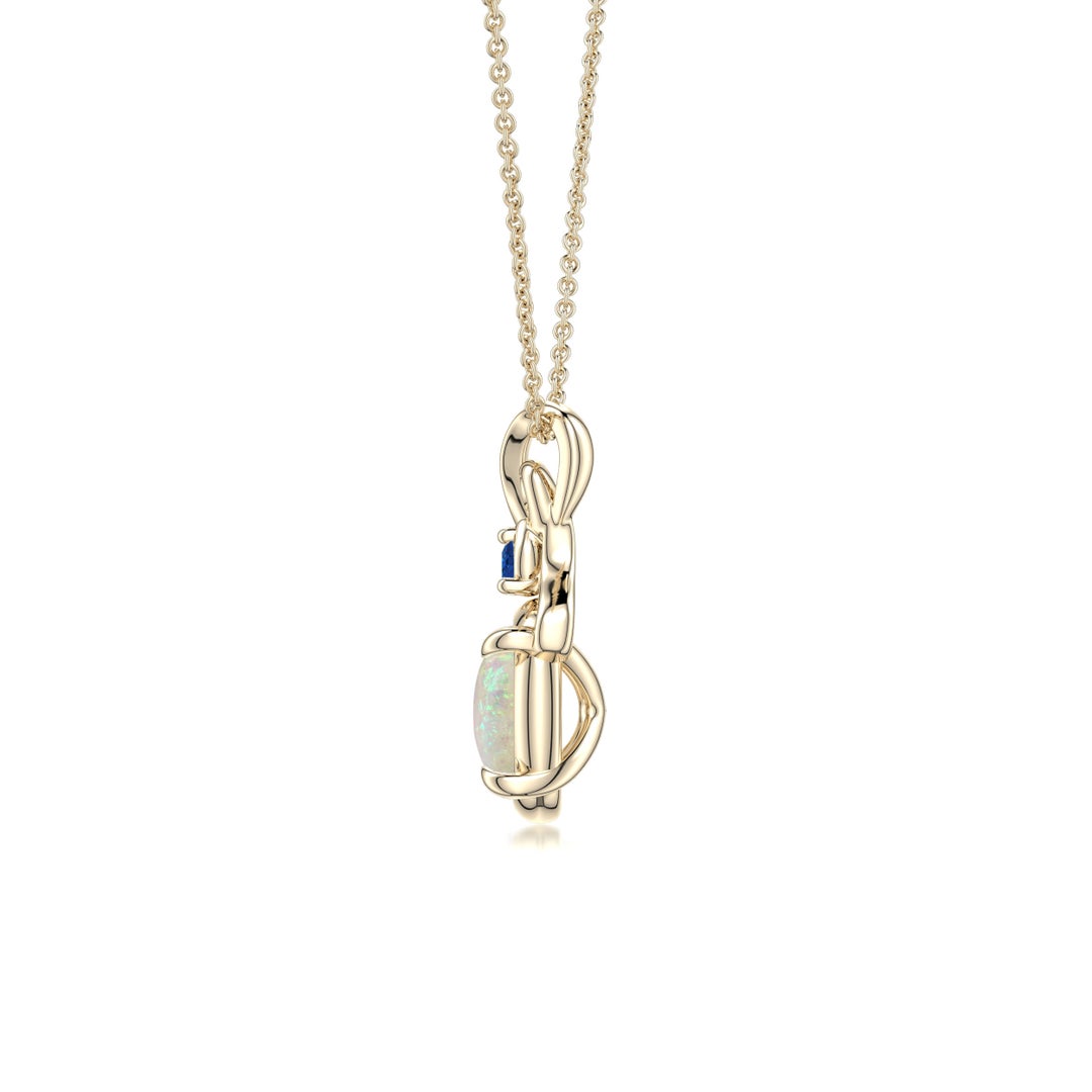 8x6mm AAA Oval Opal Swirl Pendant with Blue Sapphire Accent in Yellow Gold - side 2