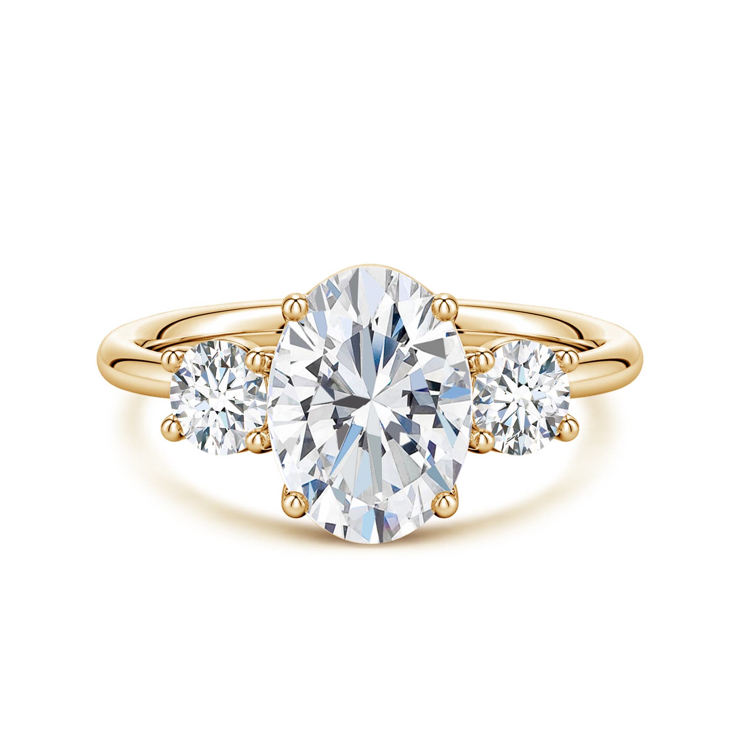 9.9x7.3mm FGVS Oval and Round Lab-Grown Diamond Three-Stone Engagement Ring in Yellow Gold
