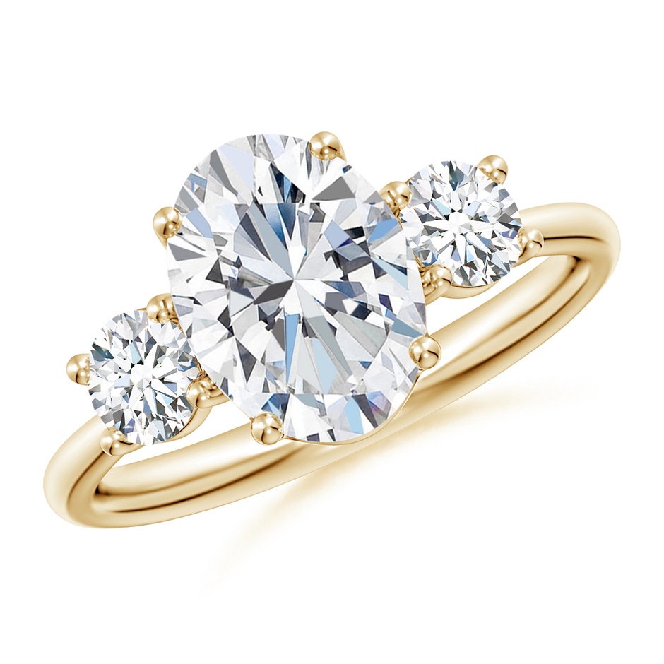 9.9x7.3mm FGVS Oval and Round Lab-Grown Diamond Three-Stone Engagement Ring in Yellow Gold 