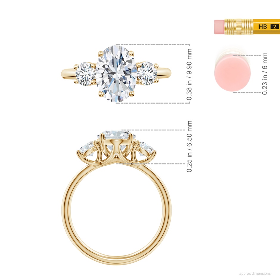 9.9x7.3mm FGVS Oval and Round Lab-Grown Diamond Three-Stone Engagement Ring in Yellow Gold ruler