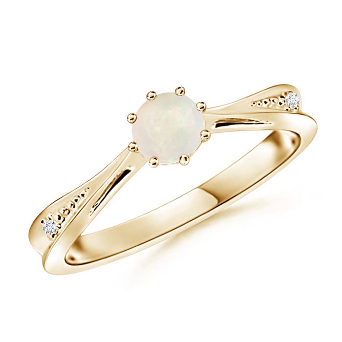 A - Opal / 0.35 CT / 14 KT Yellow Gold