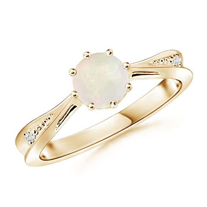 A - Opal / 0.52 CT / 14 KT Yellow Gold