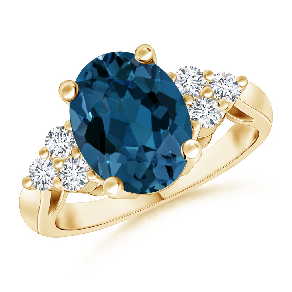 10x8mm AAA Oval London Blue Topaz Cocktail Ring with Trio Diamonds in Yellow Gold