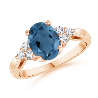 8x6mm A Oval London Blue Topaz Cocktail Ring with Trio Diamonds in 9K Rose Gold