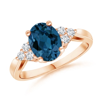 8x6mm AAA Oval London Blue Topaz Cocktail Ring with Trio Diamonds in 9K Rose Gold