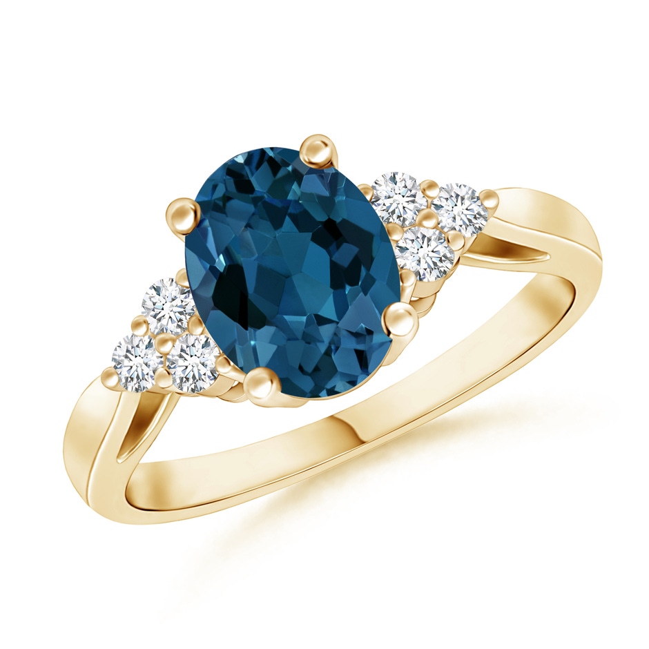 8x6mm AAA Oval London Blue Topaz Cocktail Ring with Trio Diamonds in Yellow Gold 