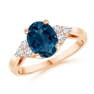 8x6mm AAAA Oval London Blue Topaz Cocktail Ring with Trio Diamonds in 9K Rose Gold