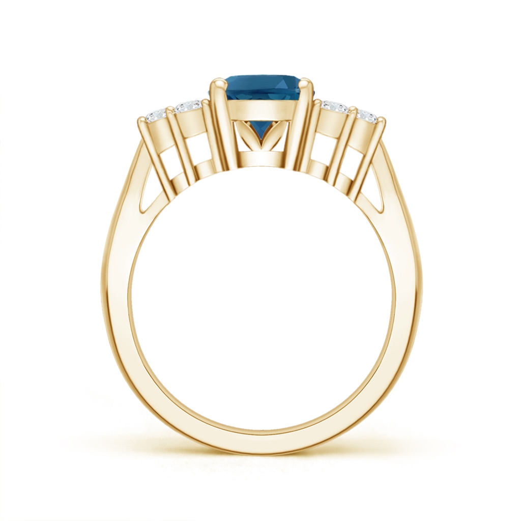 9x7mm AAA Oval London Blue Topaz Cocktail Ring with Trio Diamonds in Yellow Gold Product Image