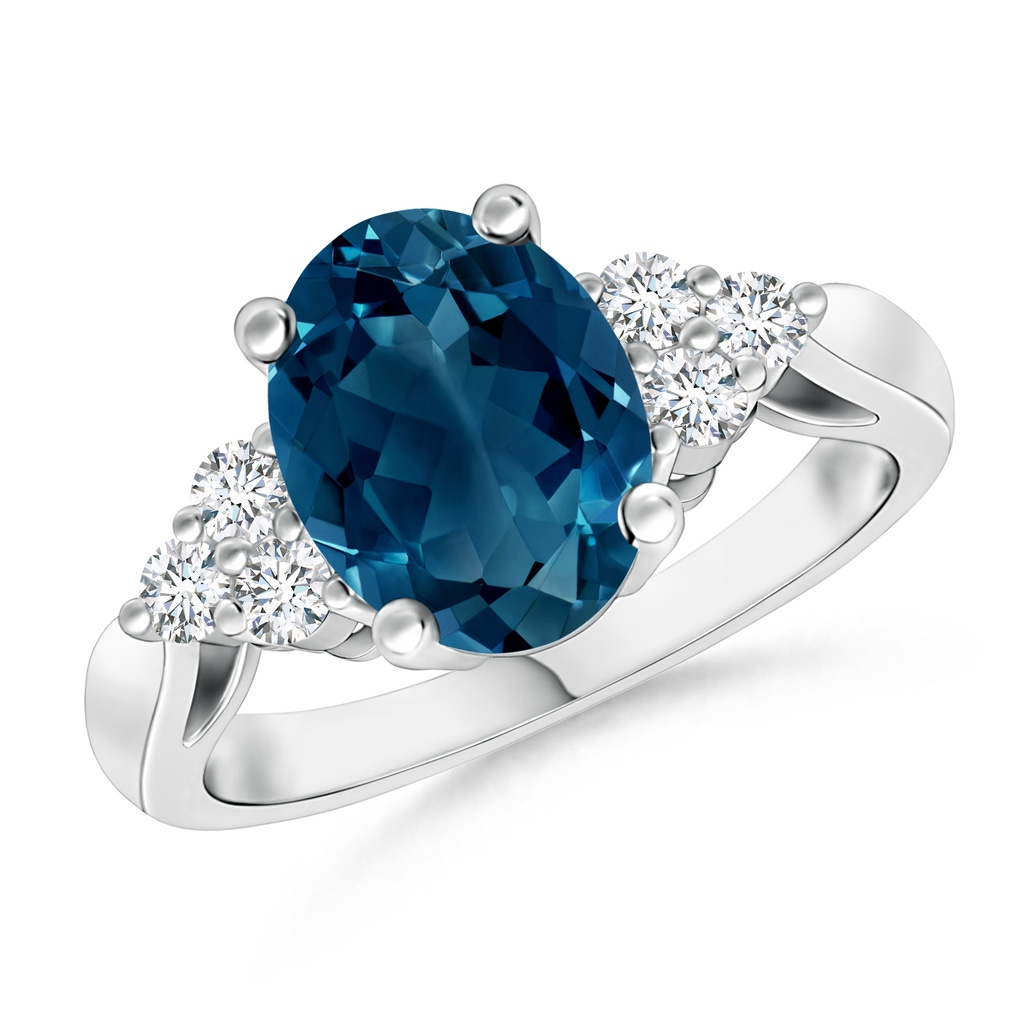 9x7mm AAAA Oval London Blue Topaz Cocktail Ring with Trio Diamonds in White Gold
