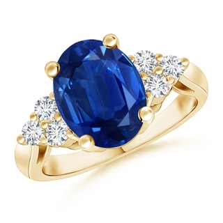 10x8mm AAA Oval Blue Sapphire Cocktail Ring With Trio Diamond Accents in Yellow Gold