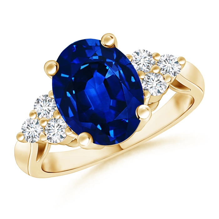10x8mm AAAA Oval Blue Sapphire Cocktail Ring With Trio Diamond Accents in Yellow Gold