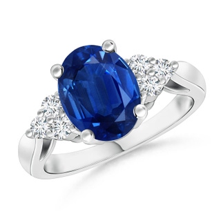 9x7mm AAA Oval Blue Sapphire Cocktail Ring With Trio Diamond Accents in White Gold