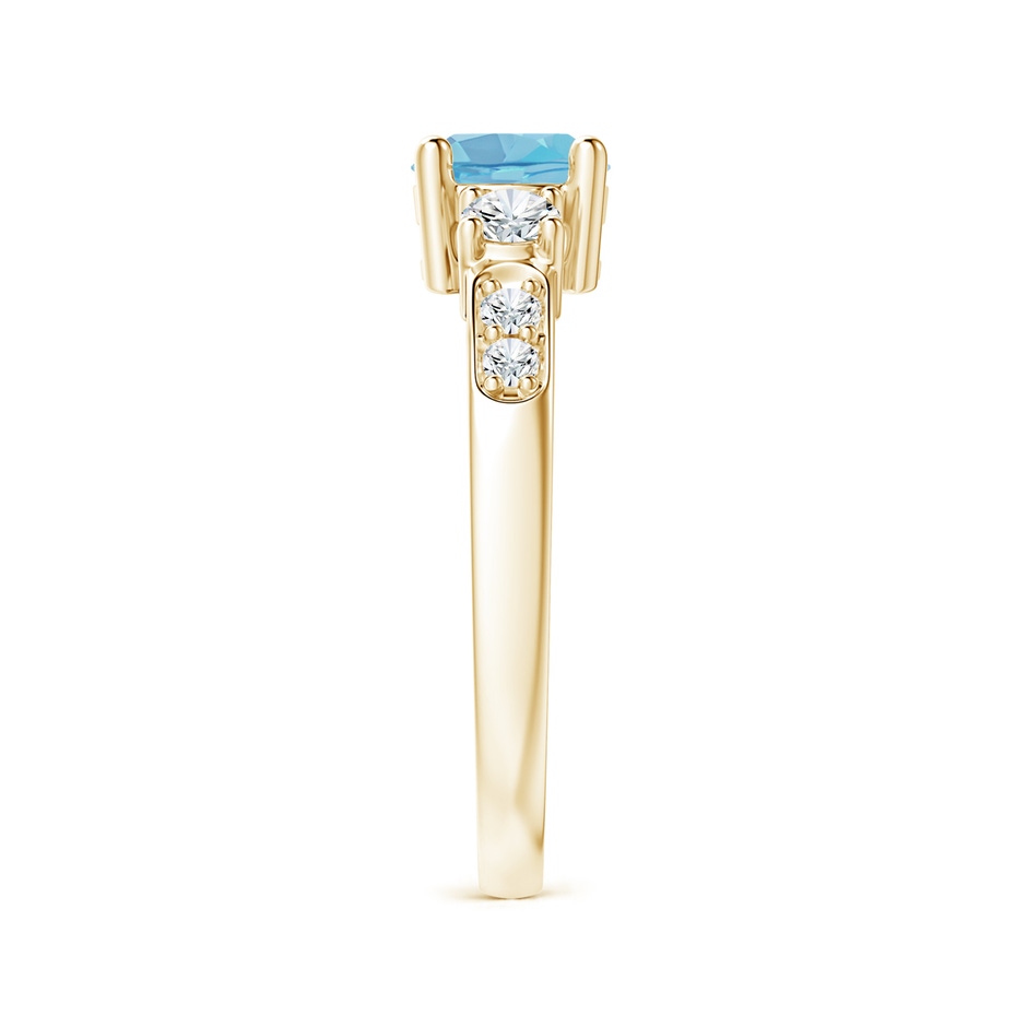 6mm A Three Stone Swiss Blue Topaz and Diamond Ring in Yellow Gold side-2