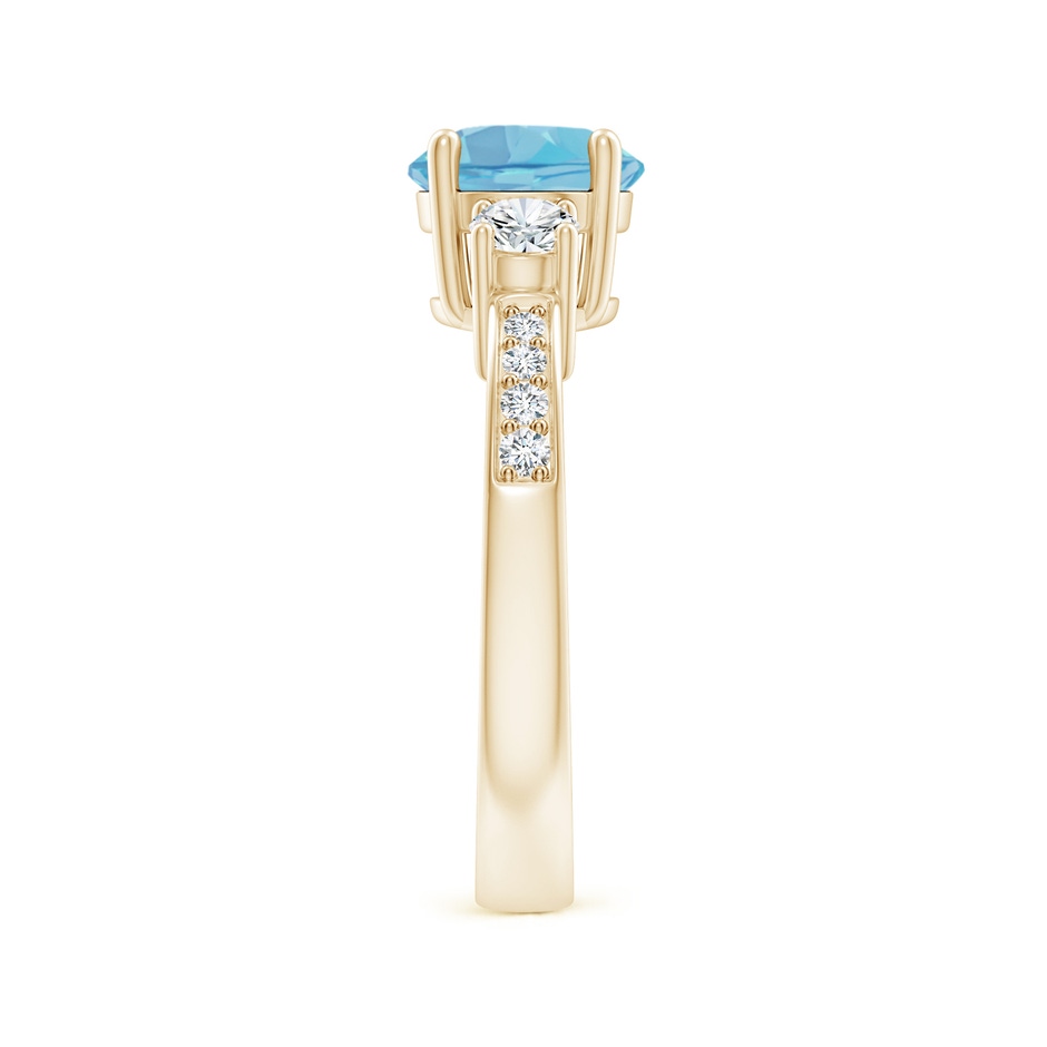 7mm A Classic Three Stone Round Swiss Blue Topaz and Diamond Engagement Ring in 18K Yellow Gold side 299