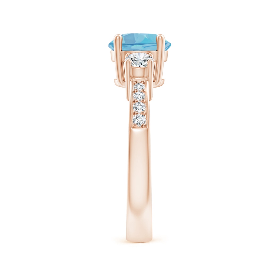 7mm A Classic Three Stone Round Swiss Blue Topaz and Diamond Engagement Ring in Rose Gold side 299