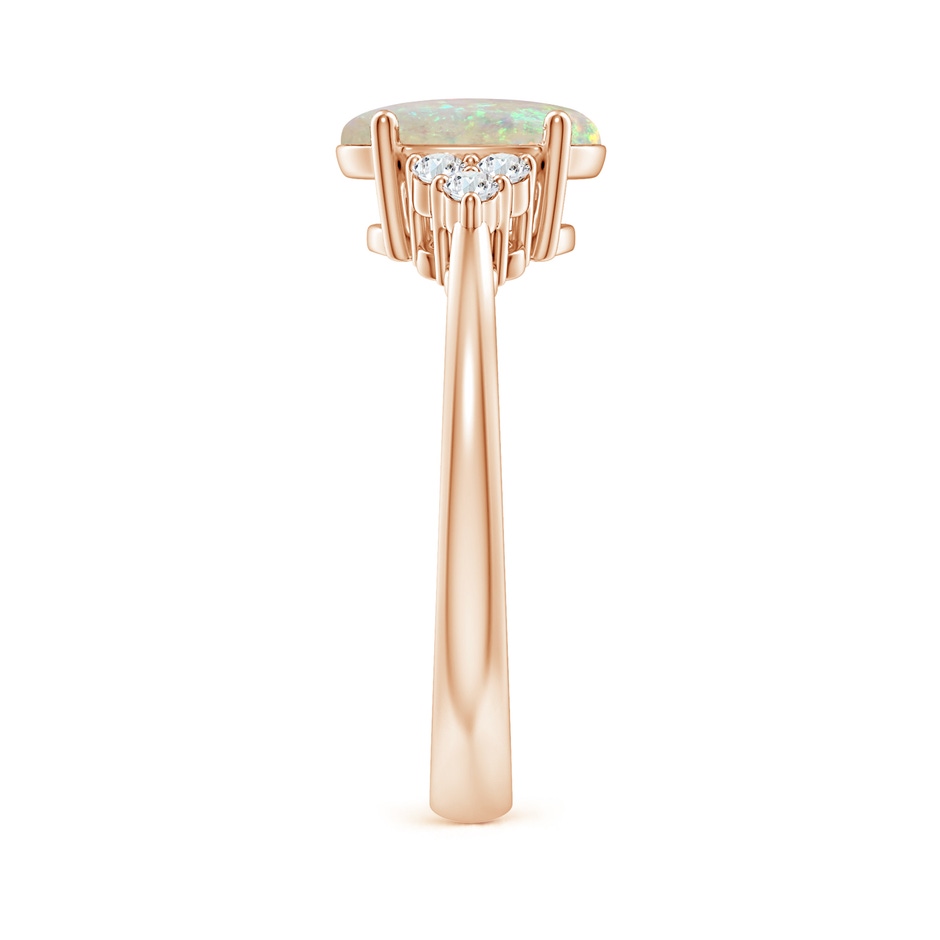 9x7mm AAA Tapered Shank Oval Opal Ring with Trio Diamond Accent in Rose Gold side 299