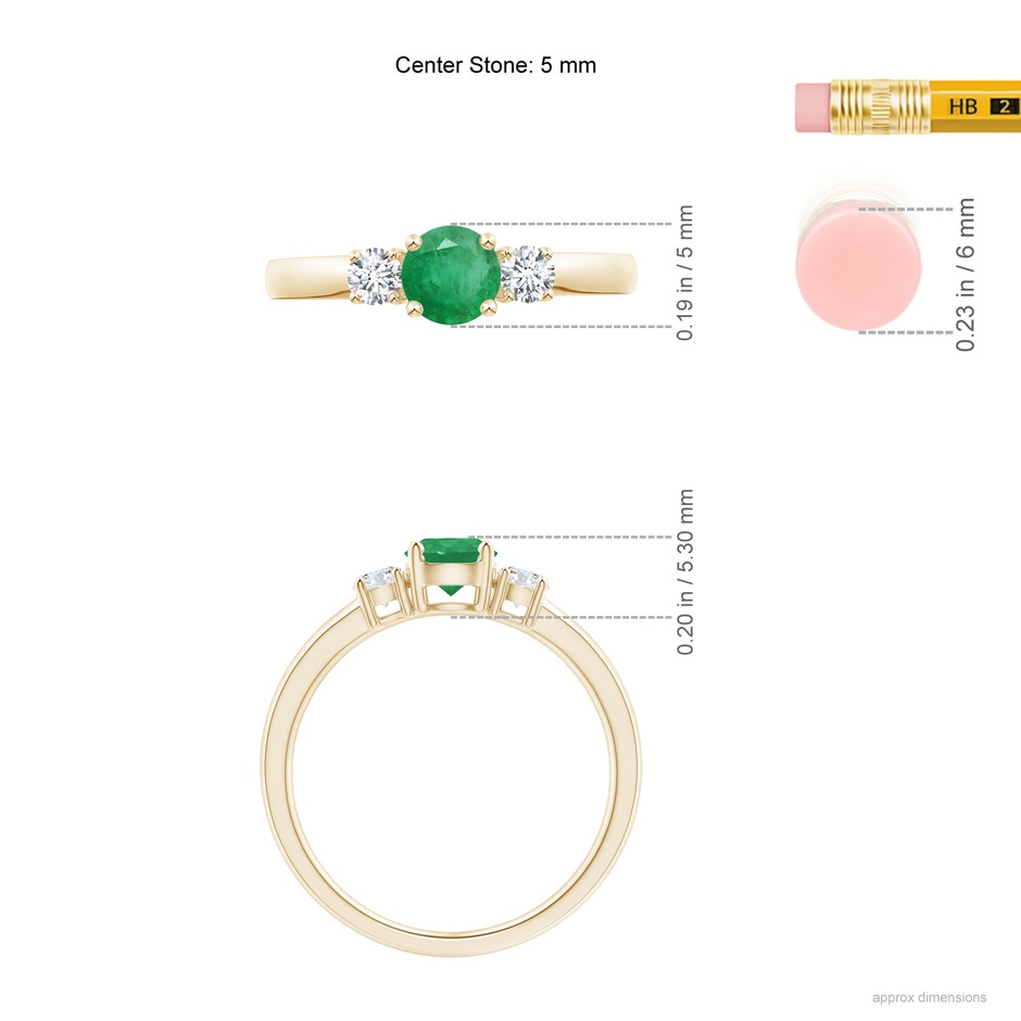 5mm A Classic Emerald and Diamond Three Stone Engagement Ring in Yellow Gold ruler