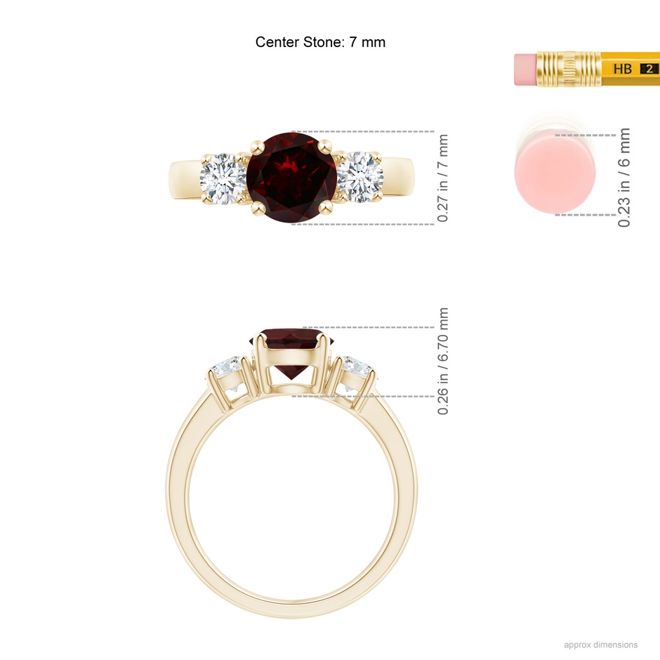 7mm A Classic Garnet and Diamond Three Stone Engagement Ring in Yellow Gold ruler