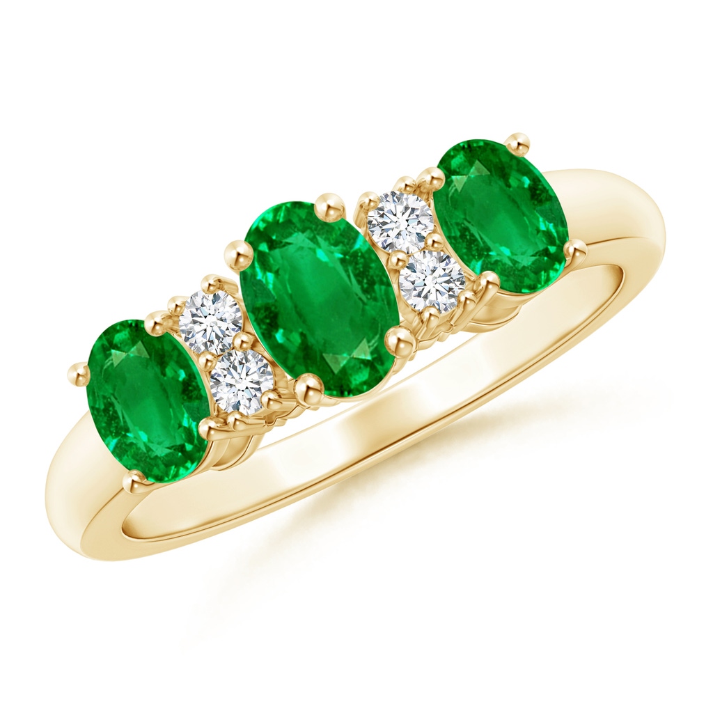 6x4mm AAAA Oval Three Stone Emerald Engagement Ring with Diamonds in Yellow Gold