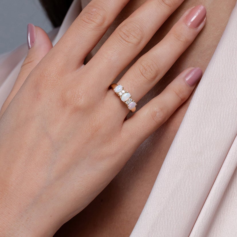 Oval Three Stone Opal Engagement Ring with Diamonds