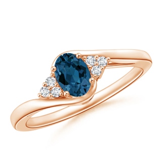 6x4mm AAA Oval London Blue Topaz Bypass Ring with Trio Diamonds in Rose Gold