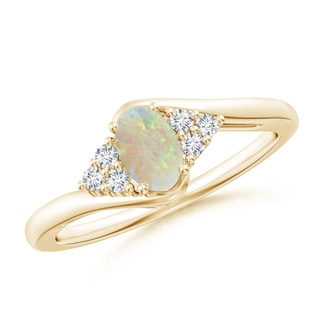 6x4mm AAA Oval Opal Bypass Ring with Trio Diamond Accents in Yellow Gold