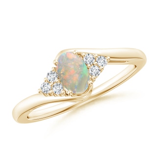 6x4mm AAAA Oval Opal Bypass Ring with Trio Diamond Accents in Yellow Gold
