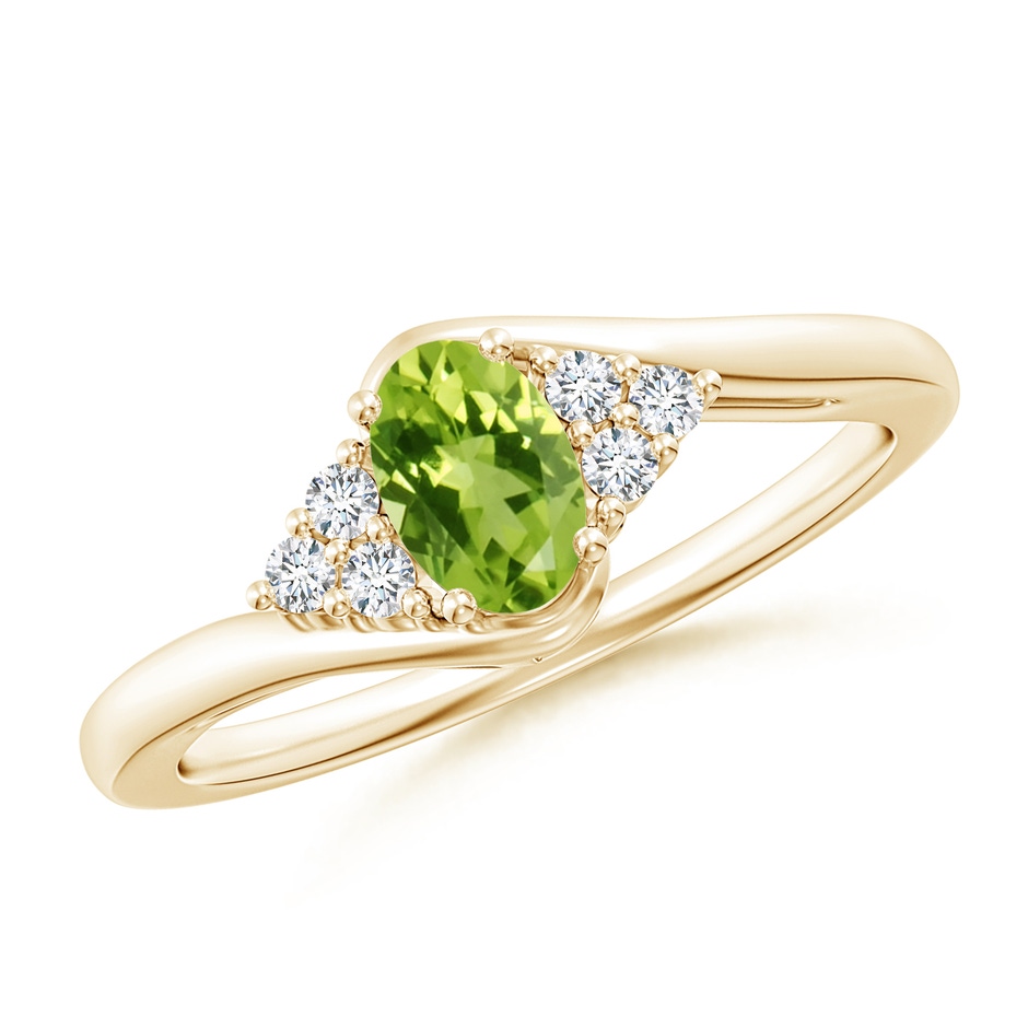 6x4mm AAA Oval Peridot Bypass Ring with Trio Diamond Accents in Yellow Gold 