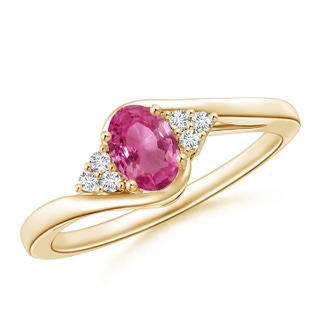 6x4mm AAAA Oval Pink Sapphire Bypass Ring with Trio Diamond Accents in Yellow Gold
