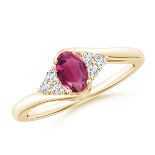 6x4mm AAAA Oval Pink Tourmaline Bypass Ring with Trio Diamond Accents in 10K Yellow Gold
