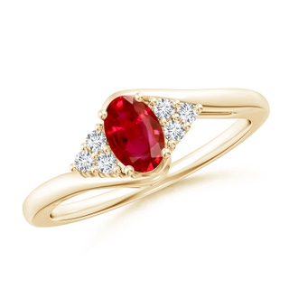 6x4mm AAA Oval Ruby Bypass Ring with Trio Diamond Accents in 9K Yellow Gold