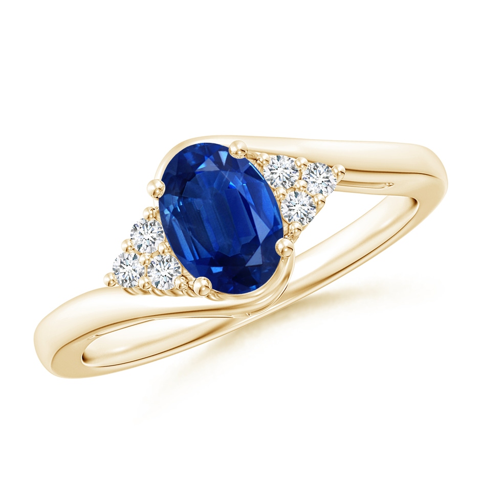 7x5mm AAA Oval Sapphire Bypass Ring with Trio Diamond Accents in Yellow Gold 