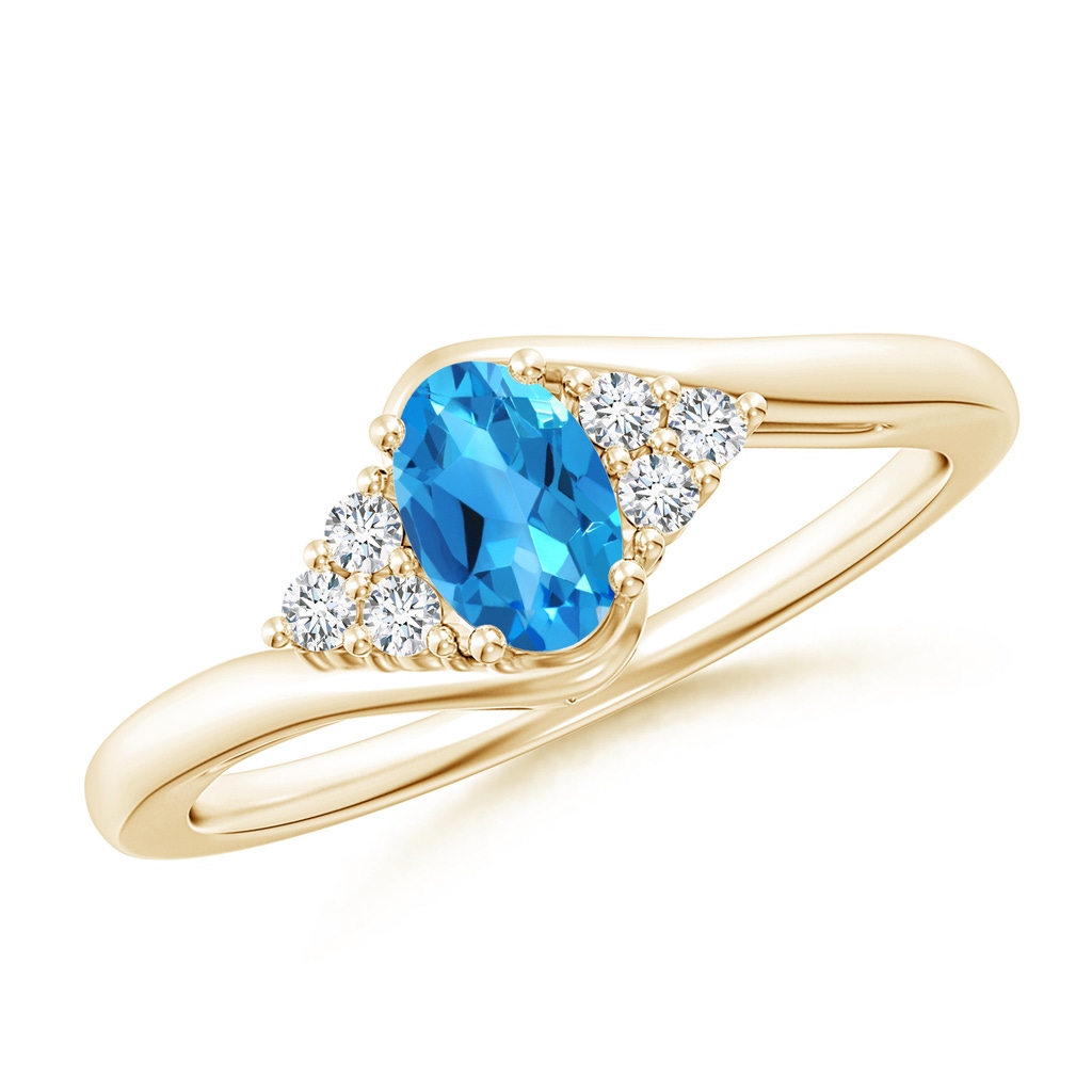 6x4mm AAAA Oval Swiss Blue Topaz Bypass Ring with Trio Diamond Accents in Yellow Gold