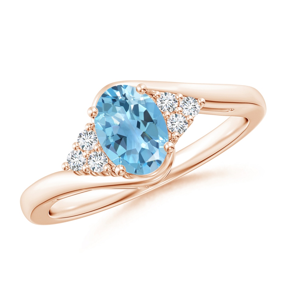 7x5mm A Oval Swiss Blue Topaz Bypass Ring with Trio Diamond Accents in Rose Gold 