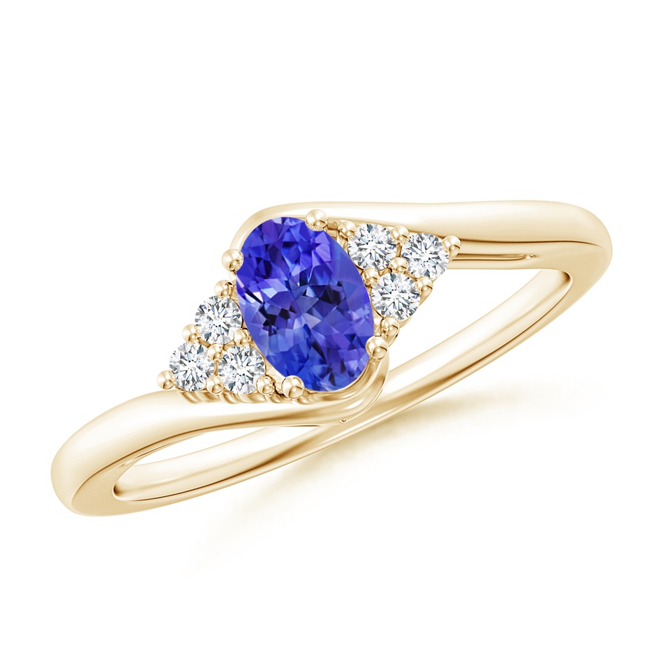 6x4mm AAAA Oval Tanzanite Bypass Ring with Trio Diamond Accents in Yellow Gold 