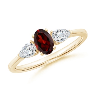 6x4mm AAA Oval Garnet Three Stone Ring with Pear Diamonds in Yellow Gold