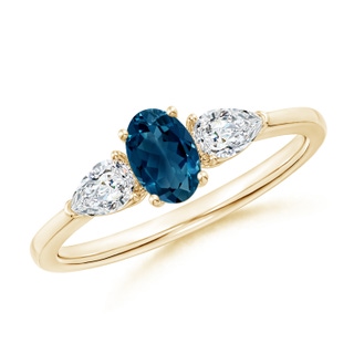 6x4mm AAAA Oval London Blue Topaz Three Stone Ring with Pear Diamonds in Yellow Gold