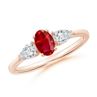 6x4mm AAA Oval Ruby Three Stone Ring with Pear Diamonds in 10K Rose Gold