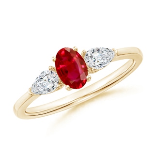 6x4mm AAA Oval Ruby Three Stone Ring with Pear Diamonds in 9K Yellow Gold