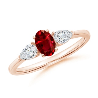 6x4mm AAAA Oval Ruby Three Stone Ring with Pear Diamonds in 10K Rose Gold
