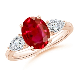 9x7mm AAA Oval Ruby Three Stone Ring with Pear Diamonds in Rose Gold