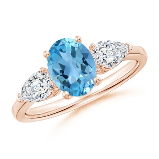 8x6mm AA Oval Swiss Blue Topaz Three Stone Ring with Pear Diamonds in Rose Gold