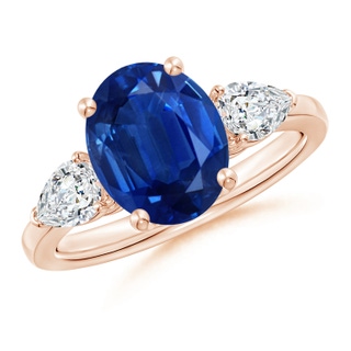 10x8mm AAA Oval Blue Sapphire Three Stone Ring with Pear Diamonds in Rose Gold